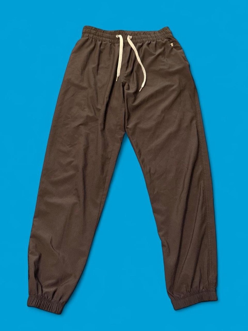 Vuori xs black joggers with drawstring waist and tapered fit